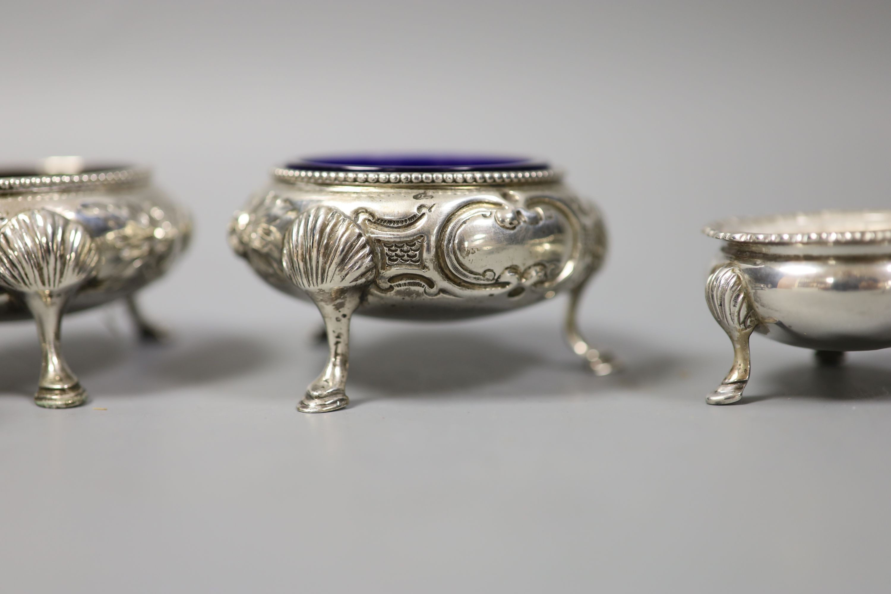 A pair of Victorian silver bun salts, London, 1862 and a set of four smaller silver salts.